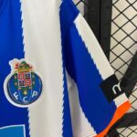 camiseta-porto-primera-equipacion-retro-2010-2011-puño
