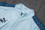 chandal-manchester-city-cremallera-baja-celeste-2025-2026-cuello