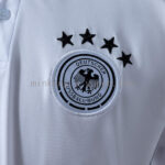 camiseta-alemania-polo-blanco-2025-2026-escudo