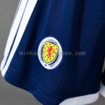 pantalon-corto-escocia-primera-equipacion-mundial-2026-escudo pantalon-corto-escocia-primera-equipacion-mundial-2026-escudo