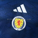 camiseta-escocia-primera-equipacion-version-jugador-mundial-2026-escudo