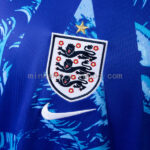 camiseta-inglaterra-portero-azul-2026-escudo