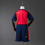 conjunto-niño-españa-primera-equipacion-2-estrellas-mundial-2026-parte-trasera conjunto-niño-españa-primera-equipacion-2-estrellas-mundial-2026-parte-trasera