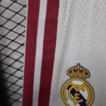 pantalon-corto-real-madrid-primera-equipacion-version-jugador-2026-2027-lateral
