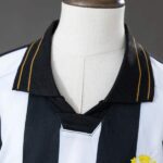 conjunto-niño-santos-fc-segunda-equipacion-2026-2027-cuello conjunto-niño-santos-fc-segunda-equipacion-2026-2027-cuello