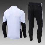 chandal-liverpool-cremallera-baja-blanc-negro-2026-2027-parte-trasera
